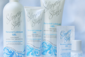 Personal lubricant gel bottles and sachets displayed.